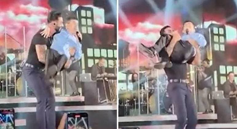 Gusttavo Lima pega Solimões no colo em gravação de DVD